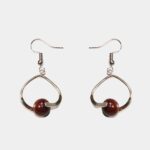 Bijoux éco-responsables en bois naturel, design intemporel et artisanal.