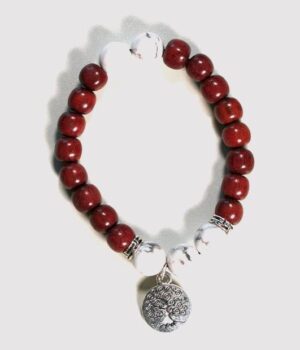 Bracelet en pierres naturelles howlite blanches Oihana avec des perles en bois d'amarante, fabriqué à la main.