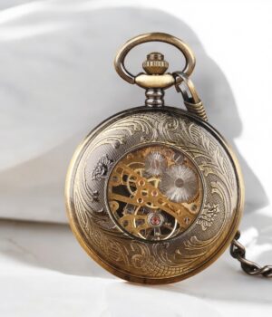 Montre à gousset orientale avec chiffres romains cuivrés et émail vert et jaune sur fond noir - My essenciel